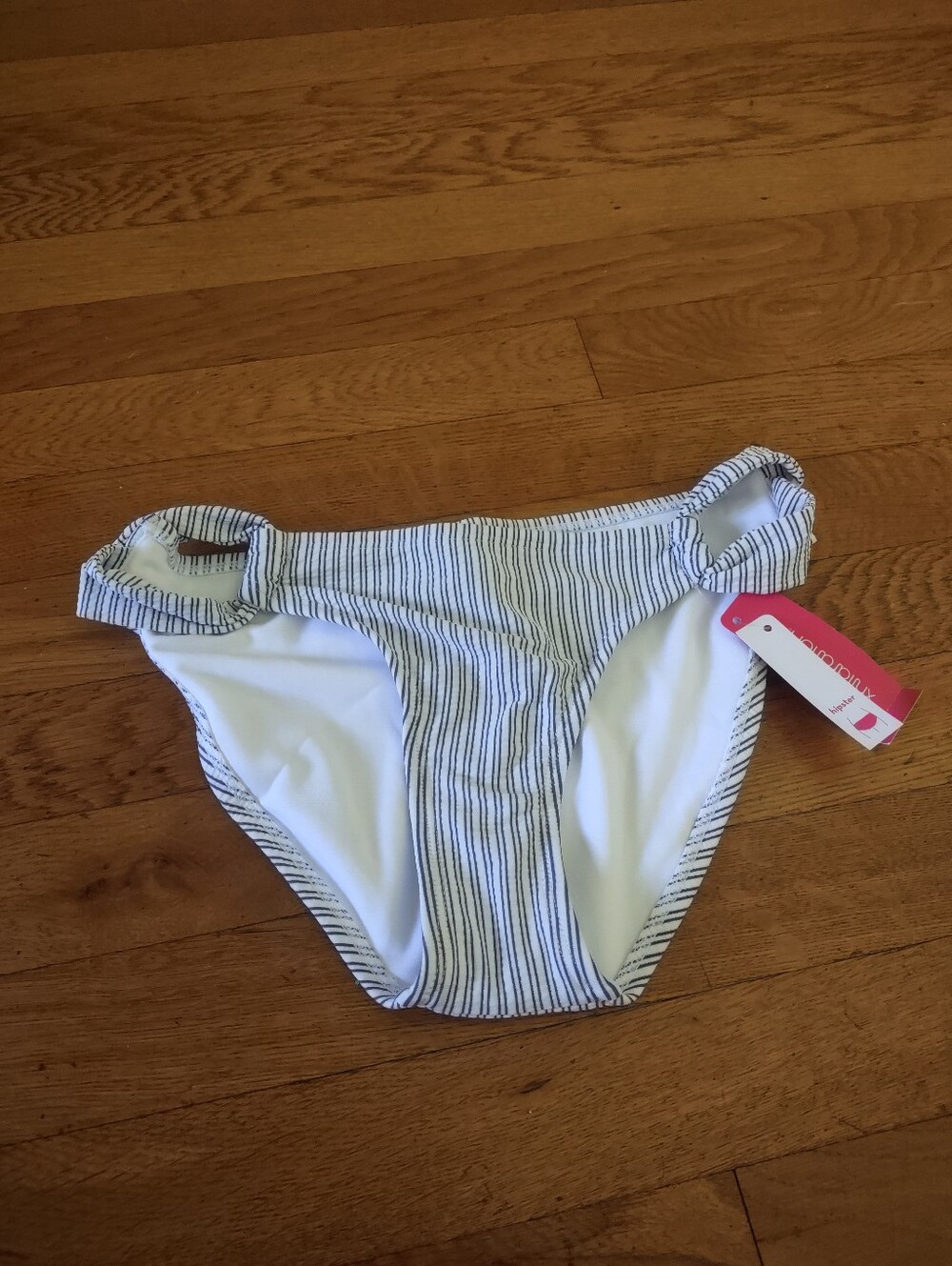 NWT black and white striped bikini bottom with cutout on sides size small